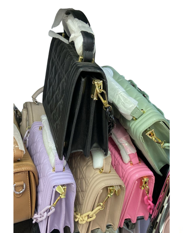 Cartera de Eco Cuero Colores Surtidos x 6 Unds. Medida: 20 x 15 cm aprox.